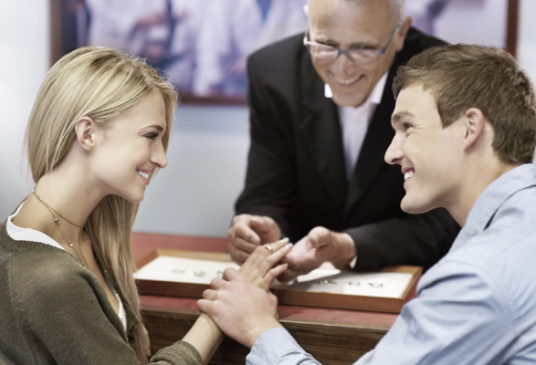 Couple trying engagement rings
